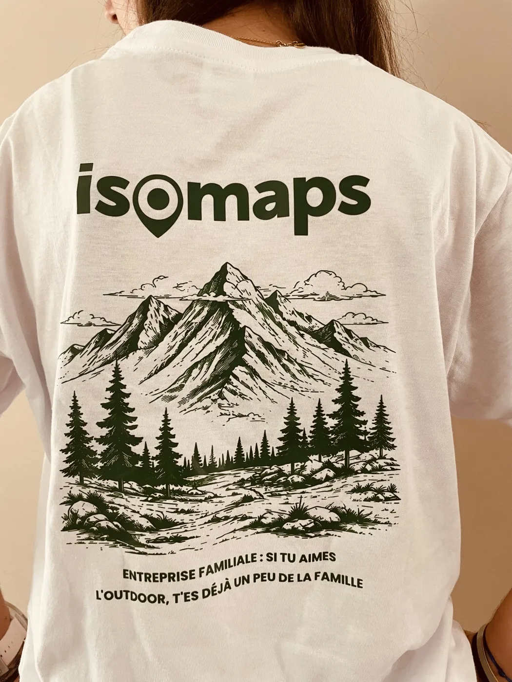 White t-shirt · Green logo